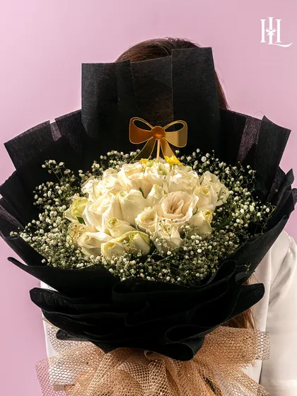 A closer look at the stunning white rose bouquet, perfect for a sophisticated and heartfelt Valentine's Day surprise.