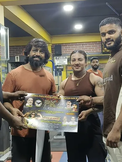 Receiving the official invitation poster for the PK Classic powerlifting event. I'm always happy to support local competitions.