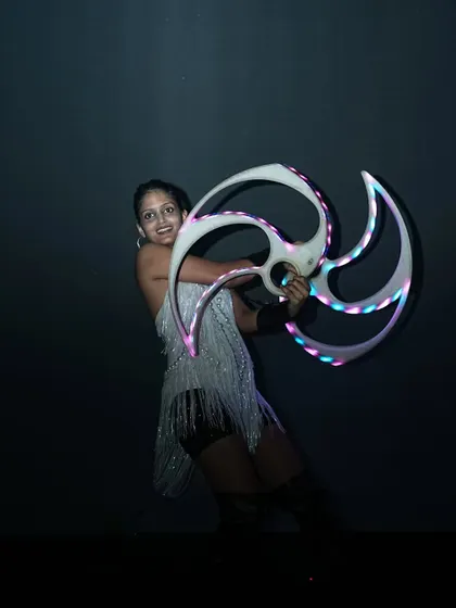 A smiling shot with one of my favorite props. The unique shape of these fans always makes for a great photo opportunity.