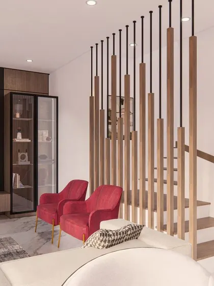 A wooden and metal rod partition elegantly separates the staircase from the main living area without closing off the space.