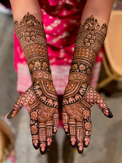 A clear, top-down shot of the traditional bridal mehendi.