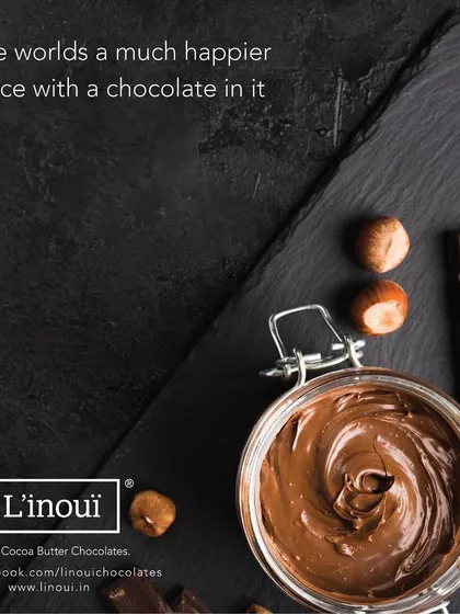 The world is a much happier place with a chocolate in it. This image of our chocolate spread, made with pure ingredients, is a reminder of the simple, joyful moments our confections can bring.
