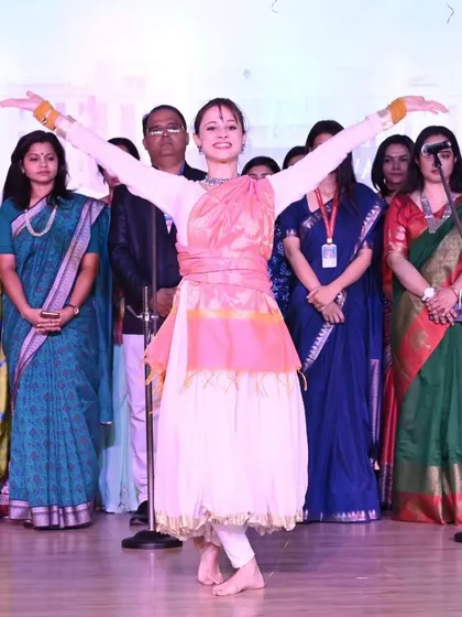 The final pose of a stage performance, a moment of connection with the audience. I choreograph complete routines from start to finish, ensuring a powerful and memorable conclusion.