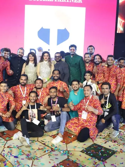 A group photo with our entire team and our amazing organizers. It truly takes a village to create a successful show, and this is our incredible family.