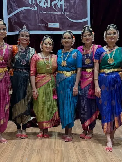 Post-performance scenes with my students after presenting "SHIVAKEERTHANAMALIKA". Their happy faces and beautiful costumes tell a story of success.