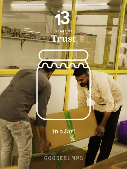 This is trust in a jar. Two teammates lift a heavy box together because they know the other won't let go. This is the kind of collaboration that makes our magic happen.