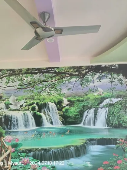 A vibrant waterfall and jungle mural, creating a lush, natural paradise on the wall.
