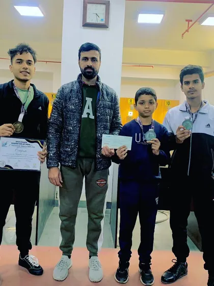 My students from the Rohini branch after winning medals at the 4th Sikh Games in 2023. We support our shooters in various competitive events.
