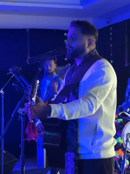 Another angle from our New Year's Eve show, capturing the dynamic between me and my bandmates. We work together to create a seamless and powerful musical experience.