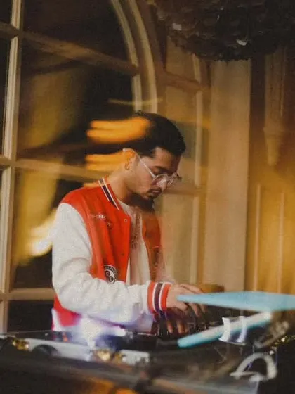 A motion blur photo that conveys the fast paced, high energy nature of my DJ sets in a club environment.