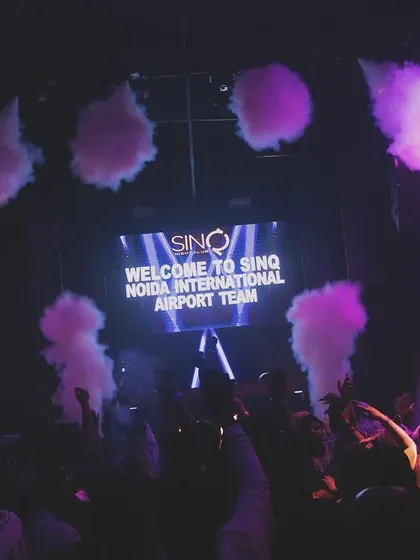 The stage at SinQ with plumes of smoke.