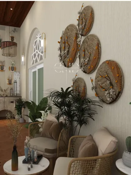 The seating area is adorned with jute wall artifacts and textured earthy paints, creating a warm, artisanal touch.