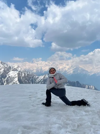 At 13,000 feet on the Surya Top summit, the world feels vast and I feel connected to its strength. This is Ashwa Sanchalanasana, or equestrian pose, a moment of grounding and gratitude with the majestic Gangotri range before me. My Himalayan yoga treks are about finding these moments of power and peace.