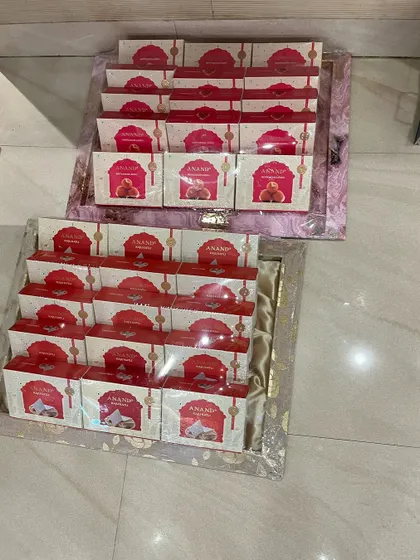 Getting ready for dispatch. We ensure every invitation, like these boxed sets with sweets, is carefully packed and ready to delight your guests.