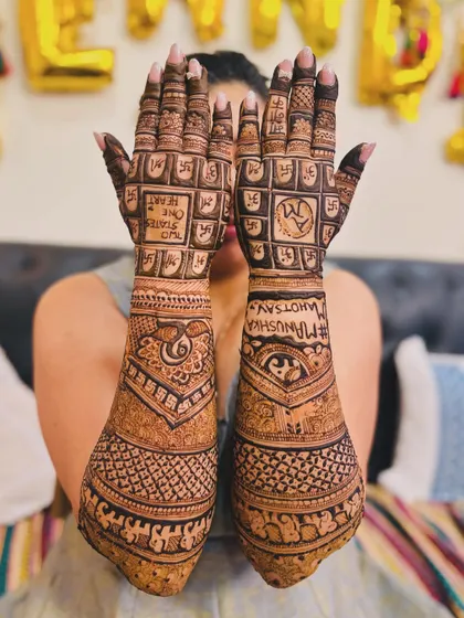 Two States, One Heart. This design celebrates a cross-cultural love story, with elements representing both families coming together.