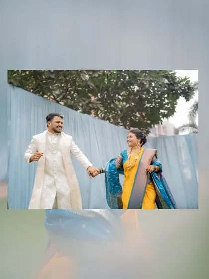 A happy shot of the bride and groom walking hand-in-hand, their joy evident after their wedding ceremony.