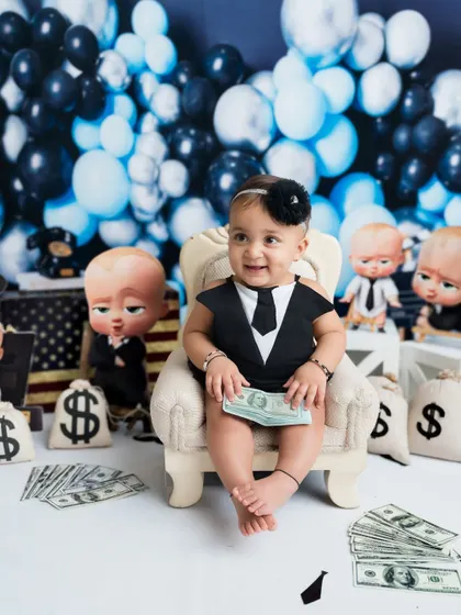 Sitting pretty on her executive chair. This little girl is rocking her "Boss Baby" themed session.