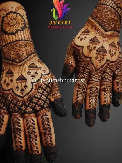 A bold and traditional design featuring jhumka motifs and heavy checkerboard patterns, perfect for a bride who wants a classic look.