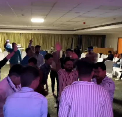 The team from Fossil with their hands up, fully engaged in the music. It was a fantastic night of celebration and fun.