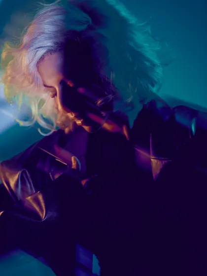 A moody, shadowed portrait from a creative shoot. This captures the darker, more introspective side of my sound.