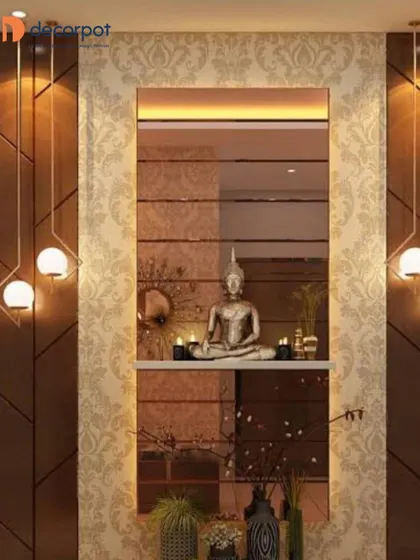 A luxurious foyer design featuring a large mirror set against a damask-patterned wallpaper. The hanging pendant lights and Buddha statue create a serene and opulent welcome.
