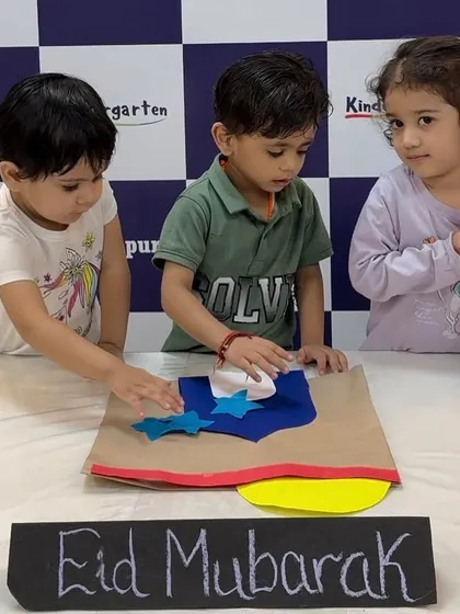 Our Yellow Butterfly class works together on an Eid craft project. Collaborative activities like this teach children teamwork while they learn about the festival.