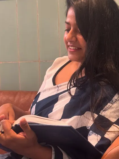 Another shot of me engrossed in my reading. The pursuit of knowledge in law is endless, and it is what gives me the edge.