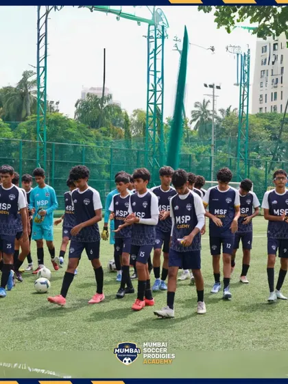 The U17 team walks onto the pitch, focused and ready for their semi-final battle.
