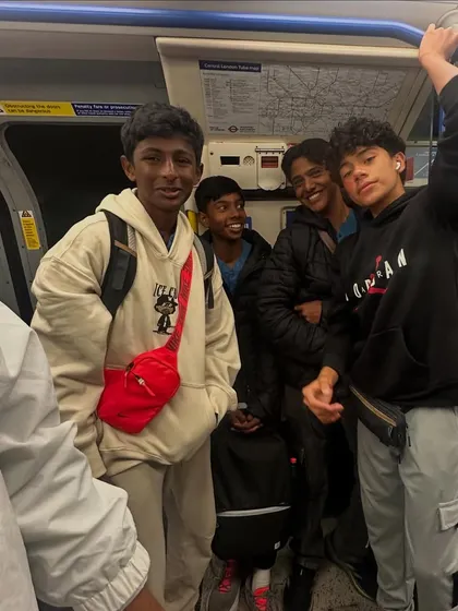 Our older players enjoying the London Underground, a real city adventure.