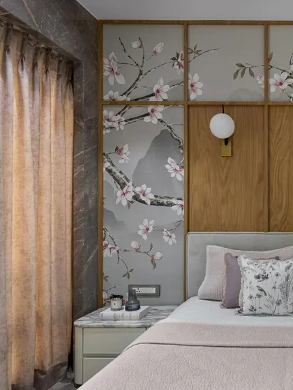 A closer look at the harmony between warm wood paneling and our custom Chinoiserie wallpaper. The soft, elegant design with blooming magnolias creates a serene and timeless charm in this bedroom sanctuary.