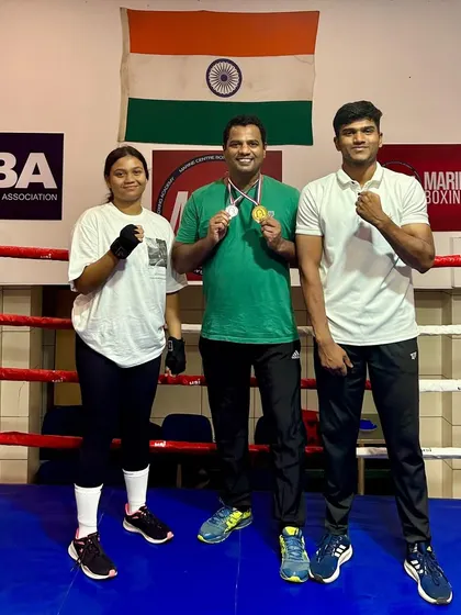 Me with our inter-collegiate medalists. Their success inspires everyone at the academy.