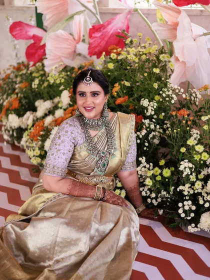 Another beautiful shot from the housewarming. The dewy makeup finish catches the light beautifully, and the traditional jewellery completes this stunning festive look.