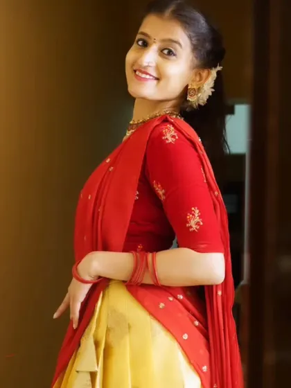 A classic red and gold Langa Davani that is perfect for any celebration. The simple elegance of this half saree makes it a timeless rental piece for your wardrobe.