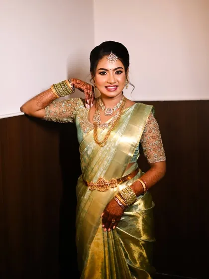 A full-length view of my client's engagement look, showing the perfect saree drape and how the makeup and styling come together.