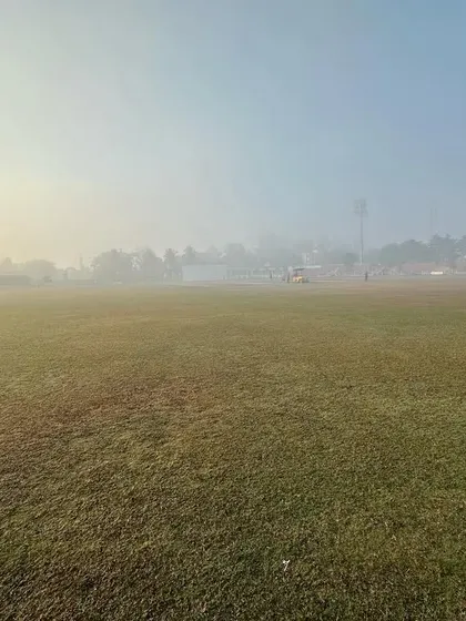 A foggy morning at the cricket ground, a peaceful start to a day of hard work.