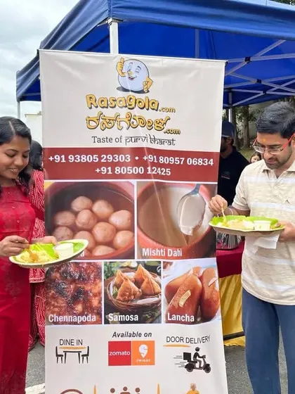 Customers enjoying our food at an outdoor event. We love participating in community gatherings and sharing our authentic, mouth-watering sweets and snacks.