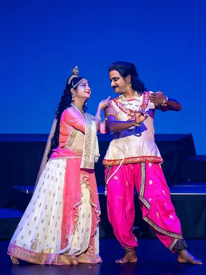 Another look at a tender duet, showcasing the chemistry and connection between performers. Choreographing these interactions is about creating a believable and touching story through dance.