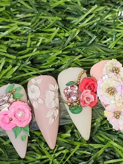 These breathtaking 3D floral nails are a masterpiece of intricate design. Each petal is a work of art, bringing a touch of spring to your fingertips.