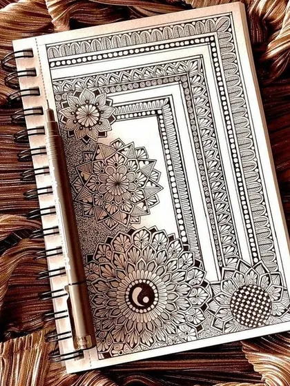 A corner mandala design in my notebook. I often play with composition on a small scale before taking it to a large wall or canvas.