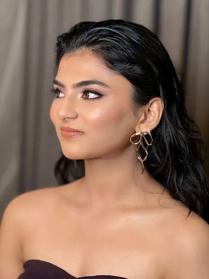 The complete look, combining the wet-look hairstyle with the dewy makeup. This style is perfect for fashion lookbooks and contemporary brands that want a polished, real vibe.