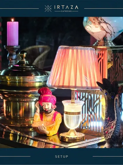 A quirky and artistic detail from one of my event setups. I enjoy incorporating unique decor elements like this traditional Rajasthani figurine and vintage-style lamp to add personality and charm to the buffet.