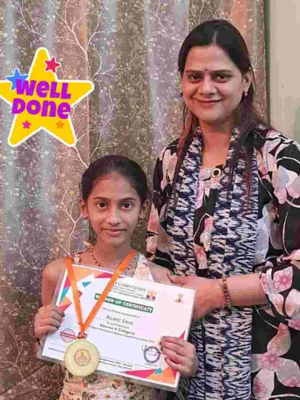 A proud moment for our student from Katra Banda, receiving a medal and certificate for her brilliant performance in the competition.