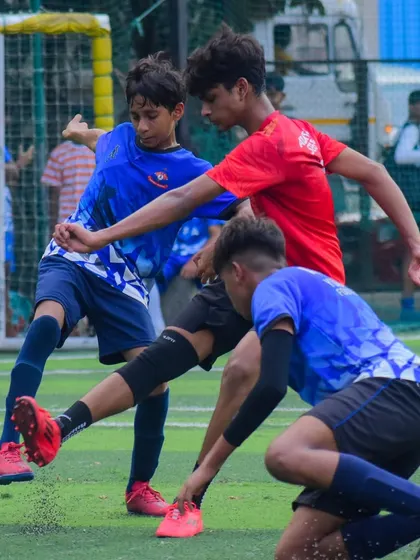 A hard-fought battle for the ball during our U15 team's 1-1 draw against Young Kickers.