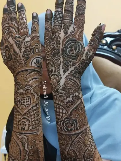 Another view of the intricate bridal hands.