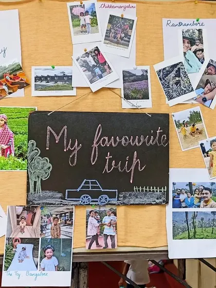 Our "My Favourite Trip" board, where children shared photos and stories from their family travels. This activity helps develop language skills and allows children to share a piece of their world with their friends.