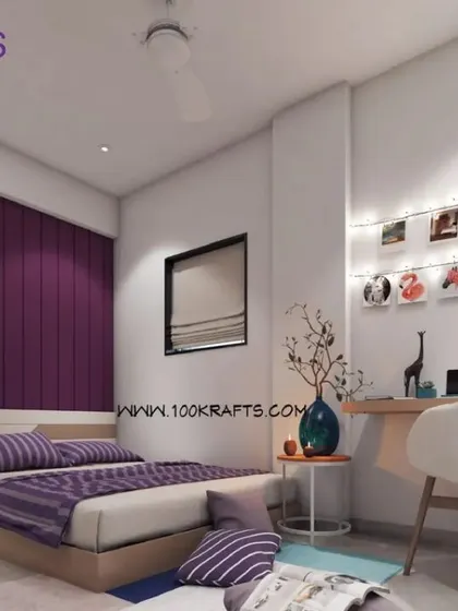A cozy bedroom with a purple accent wall and a string of photo lights above the desk. The design is personal, warm, and perfect for a young adult.