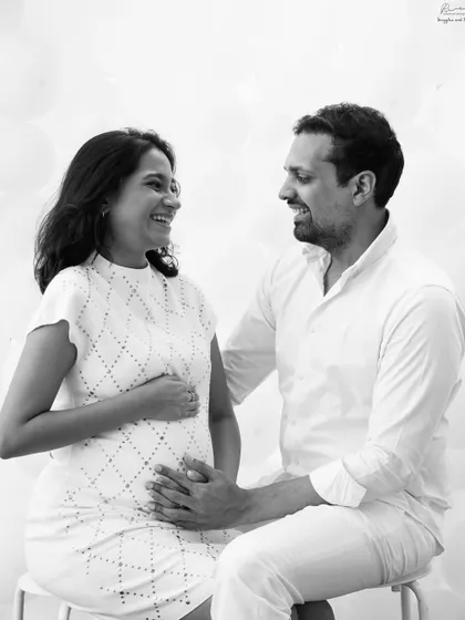 The look of love and excitement. This classic, happy portrait of an expecting couple is what maternity sessions are all about.