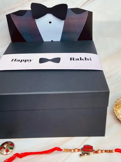 A closed view of our popular tuxedo-themed gift box for brothers, a classy way to present your Rakhi gift.