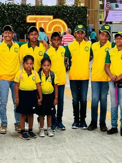 The U-16 team, including our youngest members, poses for a photo at the airport.