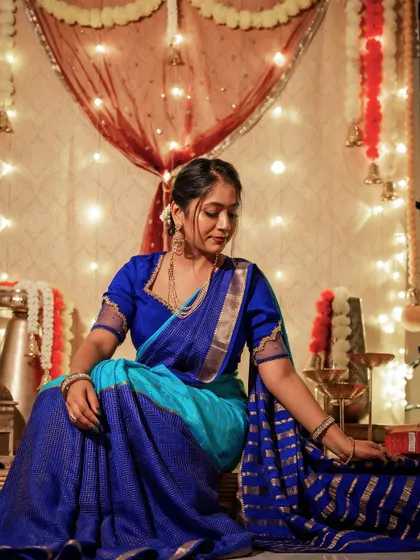 Another pose from my Deepavali celebration, showcasing the elegant fall of the silk saree. This look is all about embracing the spirit of the festival with traditional grace.